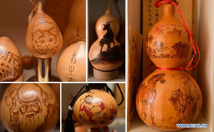 Pic story: self-taught craftsman makes over 1,000 gourd pyrography handicrafts CHINA-JILIN-CHANGCHUN-GOURD-PYROGRAPHY (CN)